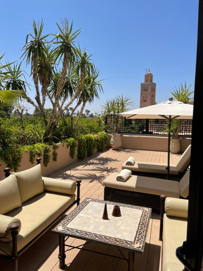 Les Jardins De La Koutoubia Hotel Marrakesh Exterior foto Rooftop terrace at the Four Seasons Hotel in Marrakech, Morocco