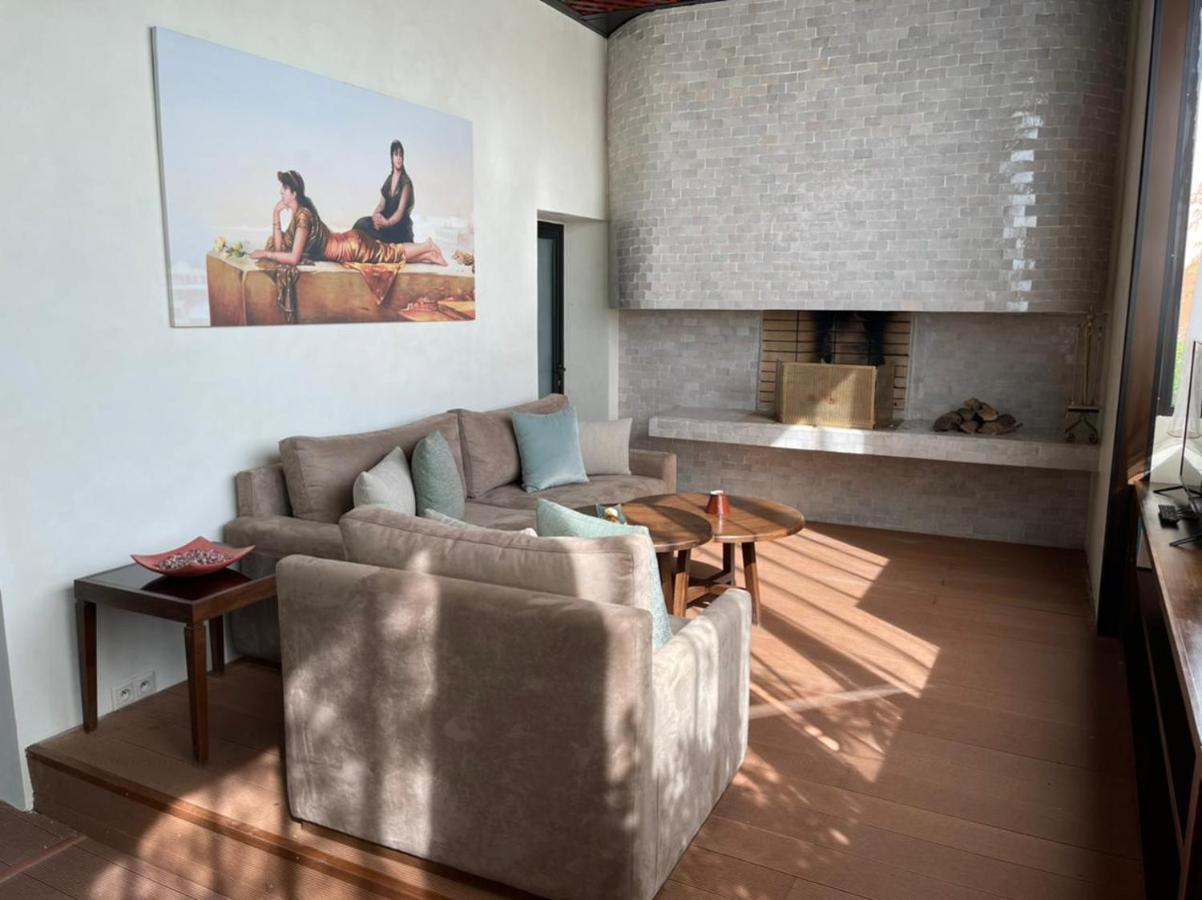 Les Jardins De La Koutoubia Hotel Marrakesh Exterior foto Living room at the 1960s house
